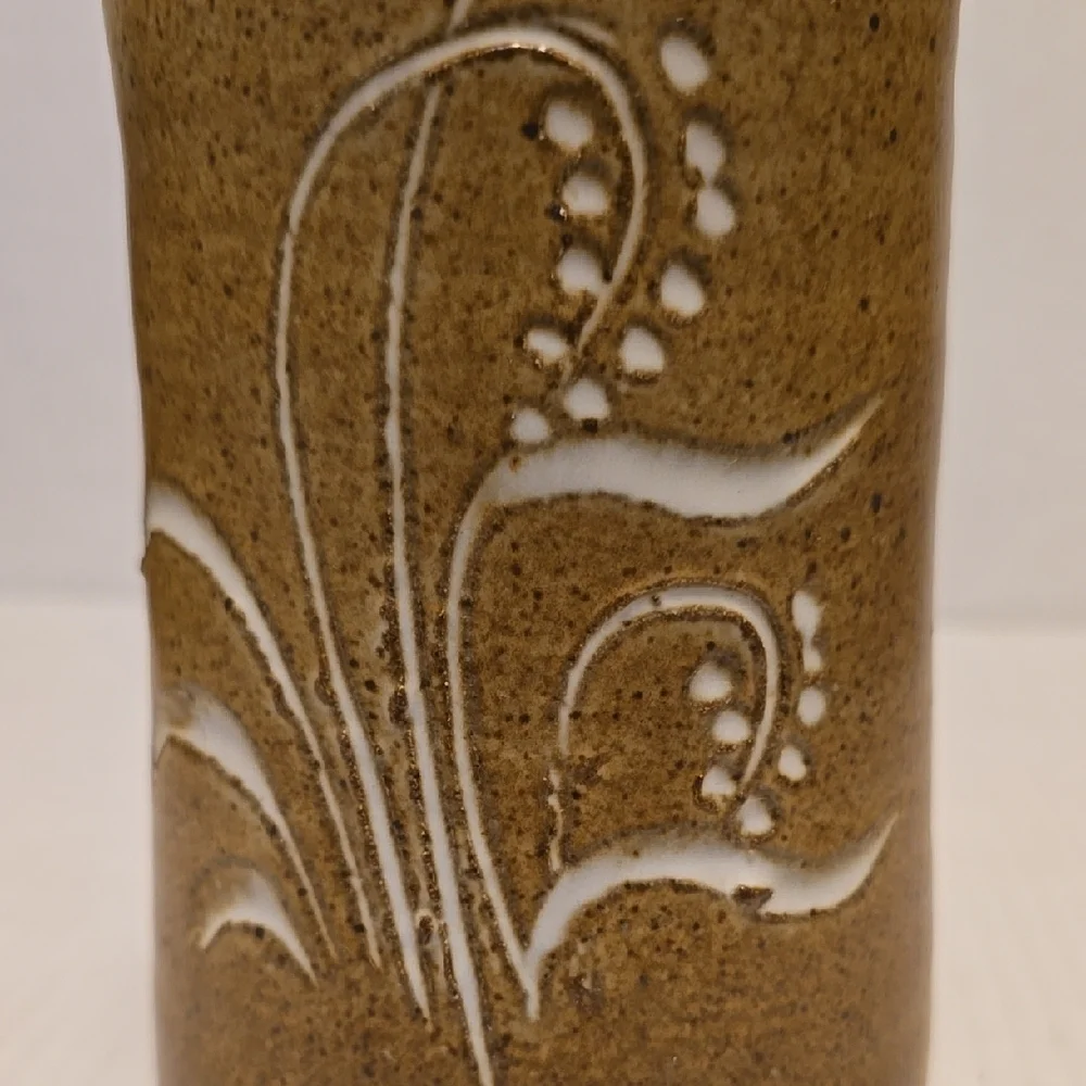 Brown Signed Pottery Vase with White Floral Design